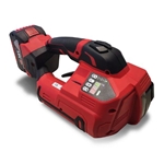 WP-4000 battery powered PET and PP strapping tool with dual batteries for pallet packaging and industrial strapping applications.